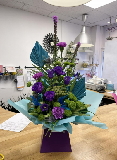 Cool Breeze - This classical stylish collection of flowers make this hand tied the perfect gift. Professionally arranged and delivered by a local florist. Flowers available for same day delivery